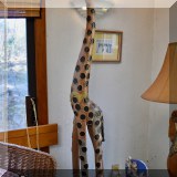 D32. Carved giraffe.